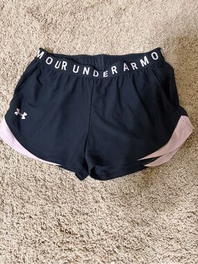 Woman’s Medium Under Armour running shorts